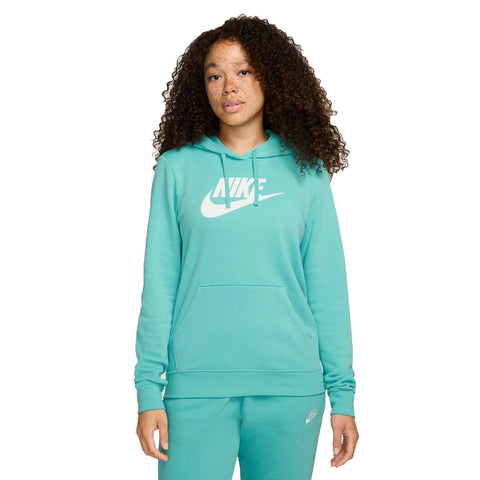 Person wearing a teal Nike hoodie and pants on a white background