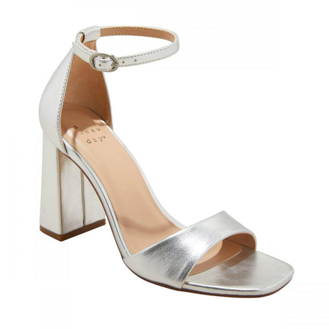 Silver high-heeled sandal on a white background