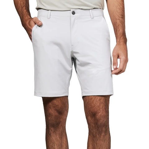 White shorts worn by a person on a white background