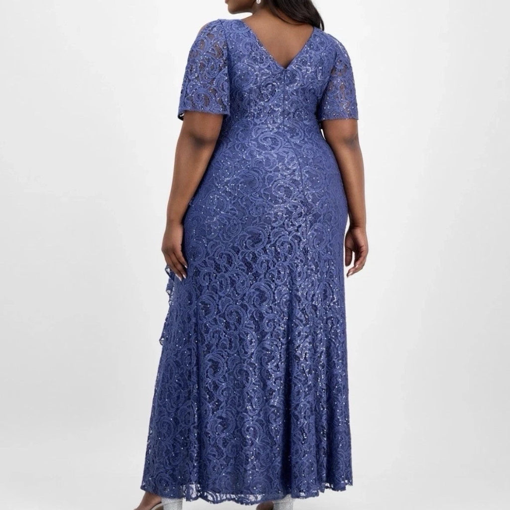 A woman modeling a blue lace maxi dress from the back, featuring short flutter sleeves, a V-neckline, and a fitted silhouette, shown against a plain white studio background.
