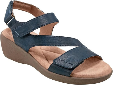 Blue wedge sandal with tan insole on a white background