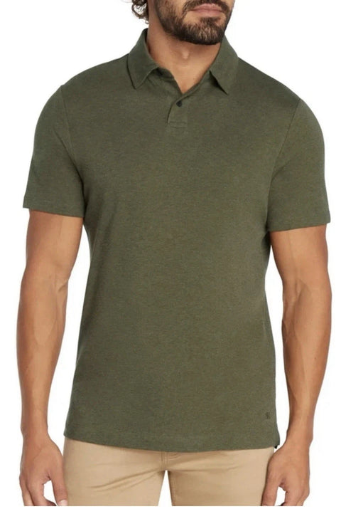 Man wearing a green polo shirt against a white background