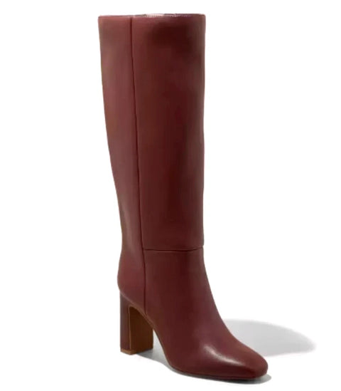 Brown knee-high boot on a white background