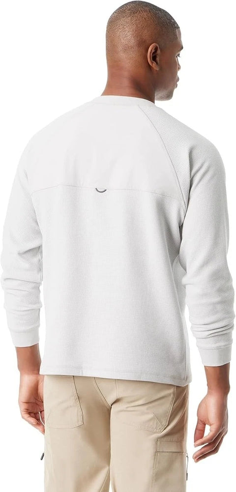 Man wearing a white long-sleeve shirt with a logo on the back, standing against a white background.