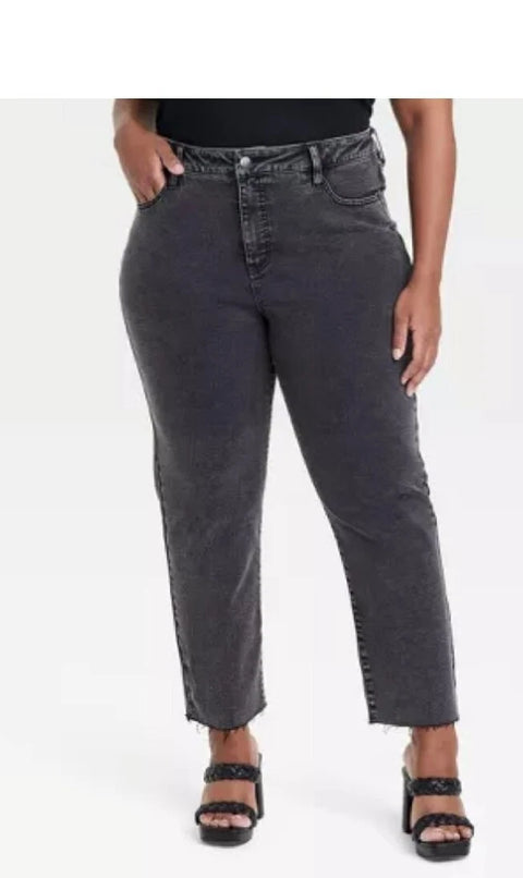 Person wearing gray jeans on a white background