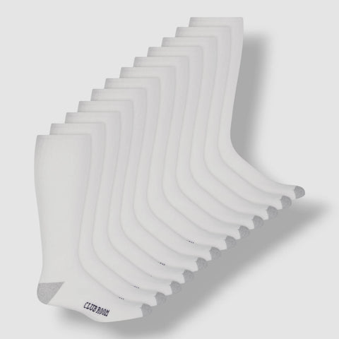 Set of white silicone placemats with 'Club Room' branding on a light gray background