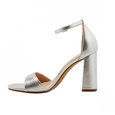 Silver high-heeled sandal on a white background