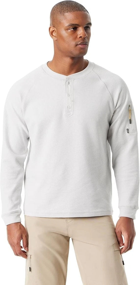 Man wearing a light gray long-sleeve shirt with a brand logo on a white background