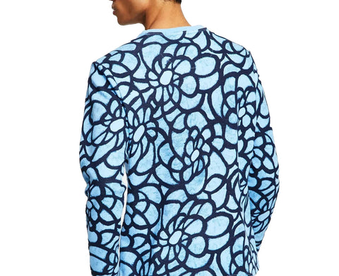 Blue floral patterned shirt on a white background