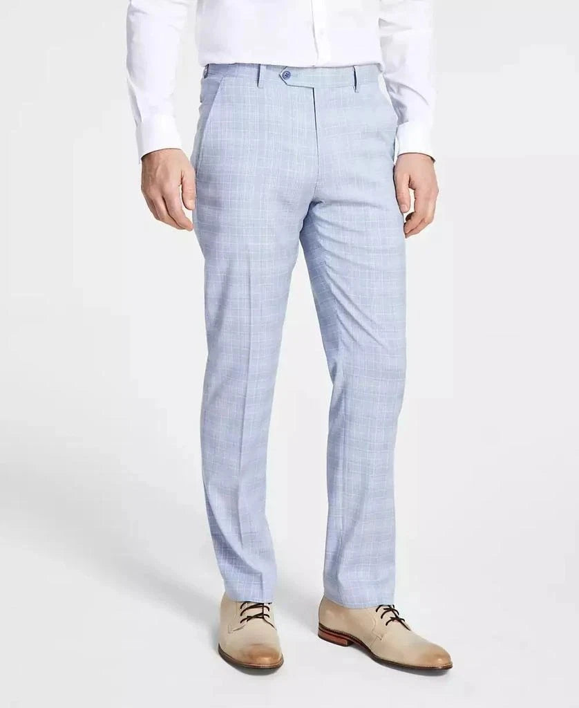 Light blue checkered pants worn by a person on a white background
