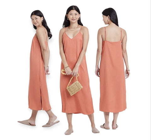 Woman wearing a peach-colored slip dress with a gold beaded handbag, shown from front, side, and back views.