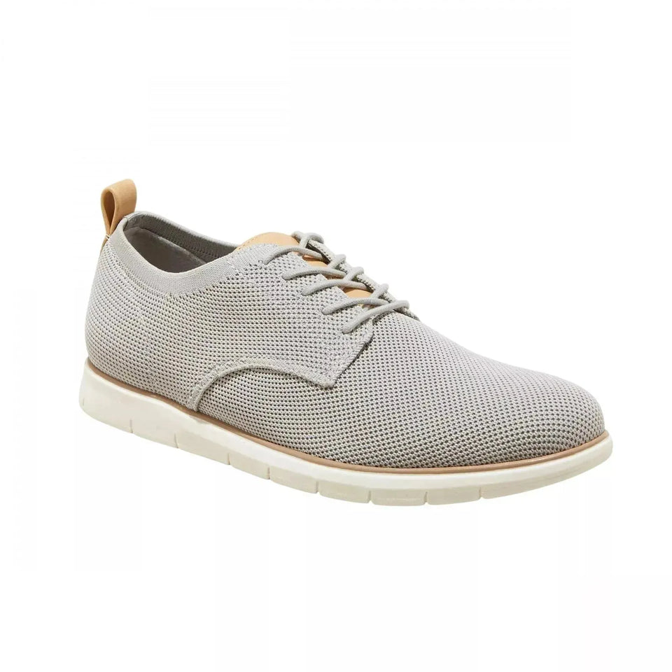Light gray sneaker with white sole on a white background