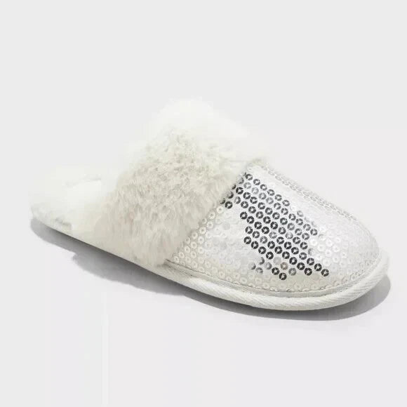 White slipper with rhinestone detail on a white background