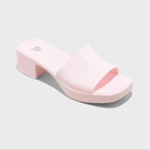 Pink slide sandal on a light gray background