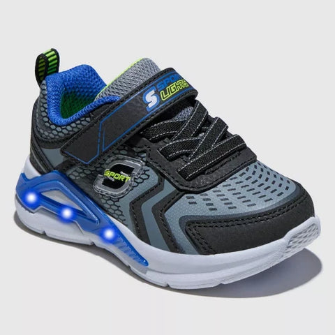 Gray and black children's sneaker with LED lights on a light gray background