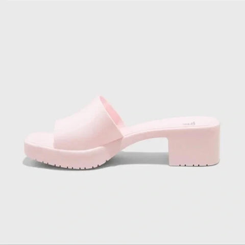 Pink platform sandal on a light gray background