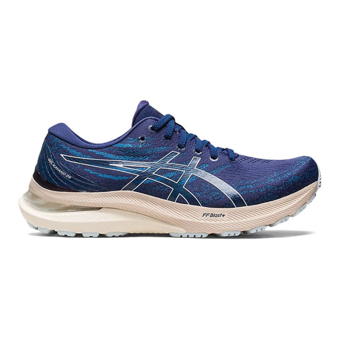 Blue running shoe with white sole on a white background