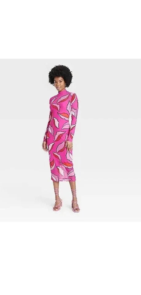 Person wearing a pink patterned dress on a white background