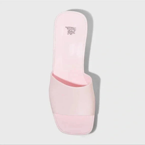 Pink slide sandal on a light gray background