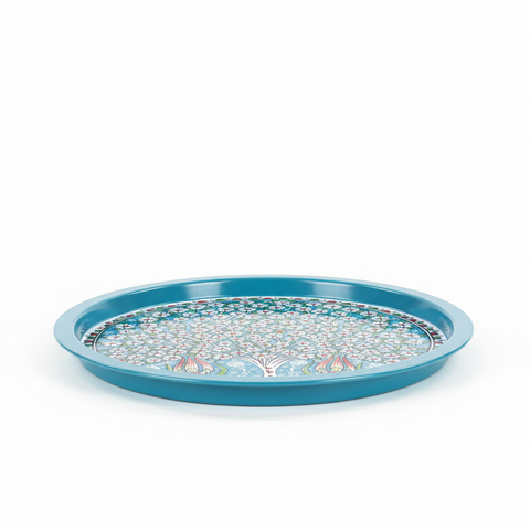 Blue decorative tray with a floral pattern on a white background