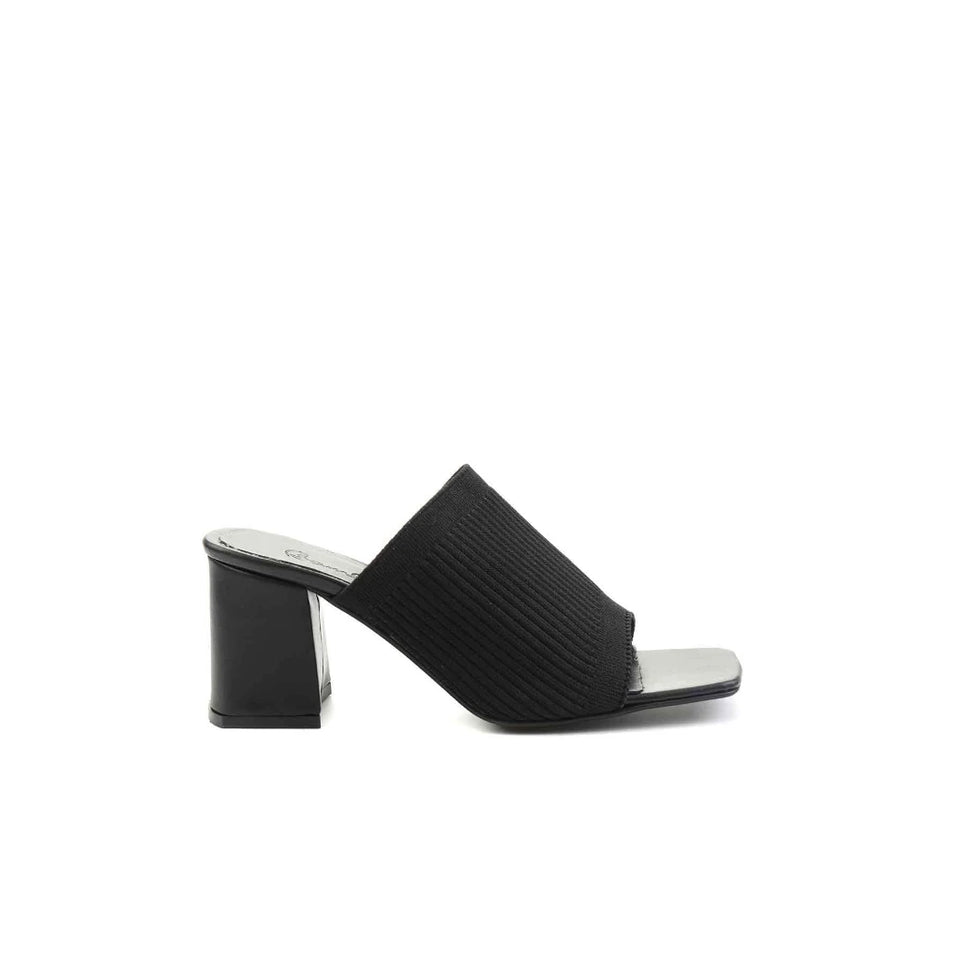 A single black open-toe mule sandal with a ribbed knit upper and a chunky block heel, shown from a side profile on a white background.