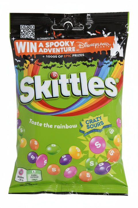 Skittles candy bag with Halloween-themed text and graphics on a green background