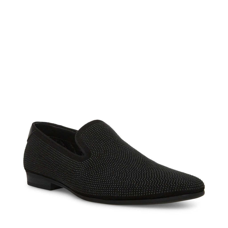 Black textured loafer shoe on a white background