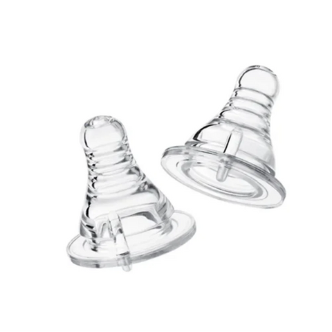 Two clear baby bottle nipples on a white background