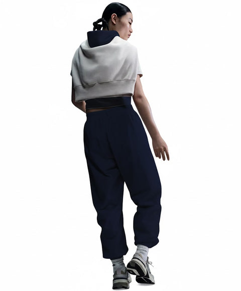 Nike Women's Petrol Sportswear Essential Mid-Rise Oversized Woven Jogger Pants | Nike In Lebanon