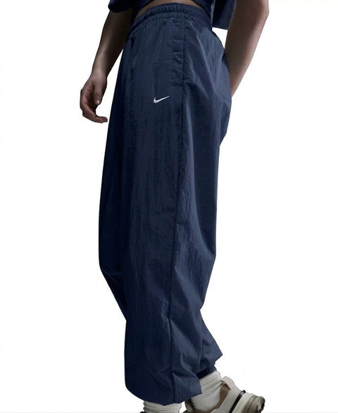 Nike Women's Petrol Sportswear Essential Mid-Rise Oversized Woven Jogger Pants | Nike In Lebanon