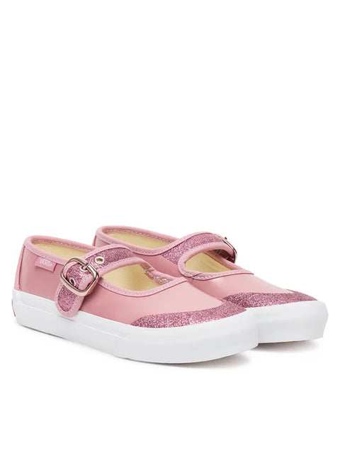 Pink glittery shoes with white soles on a white background