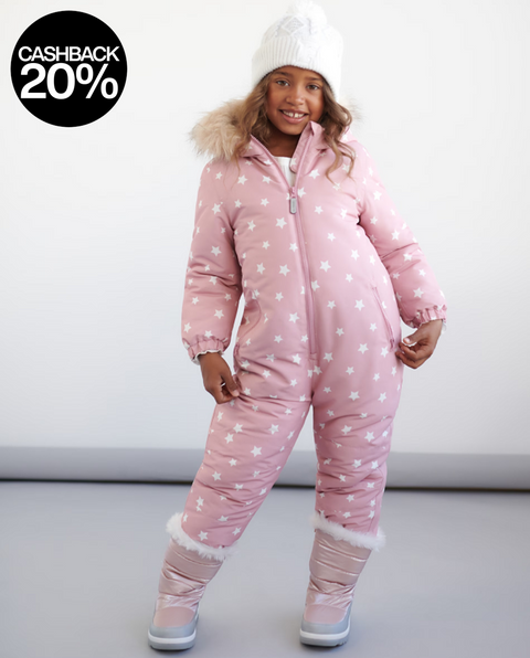 Child wearing a pink snowsuit with white star pattern on a plain background