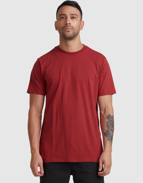 Man wearing a red t-shirt against a white background