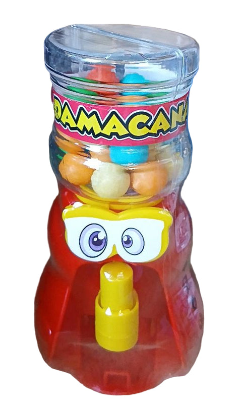 Toy with a transparent container filled with colorful candies, featuring a cartoon face on a beige surface.