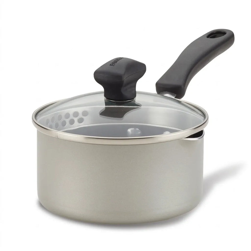 A stainless steel saucepan with a clear glass lid and black plastic handle, shown on a white background.