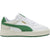 A Puma low-top sneaker in white and green, featuring a white leather upper with green suede overlays, a gold Puma logo on the side, and a thick cream-colored midsole.