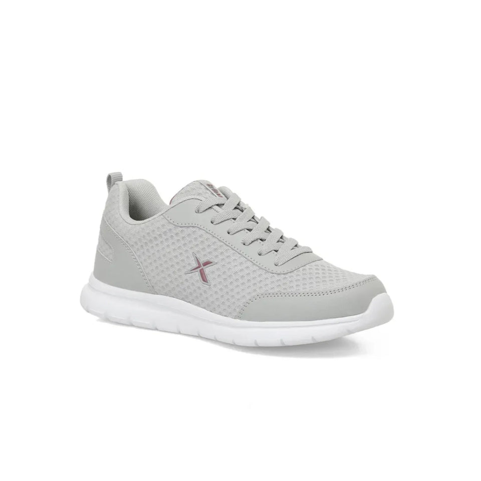 A light gray athletic sneaker with a textured mesh upper, gray laces, and a white sole, shown from a three-quarters angle on a white background.